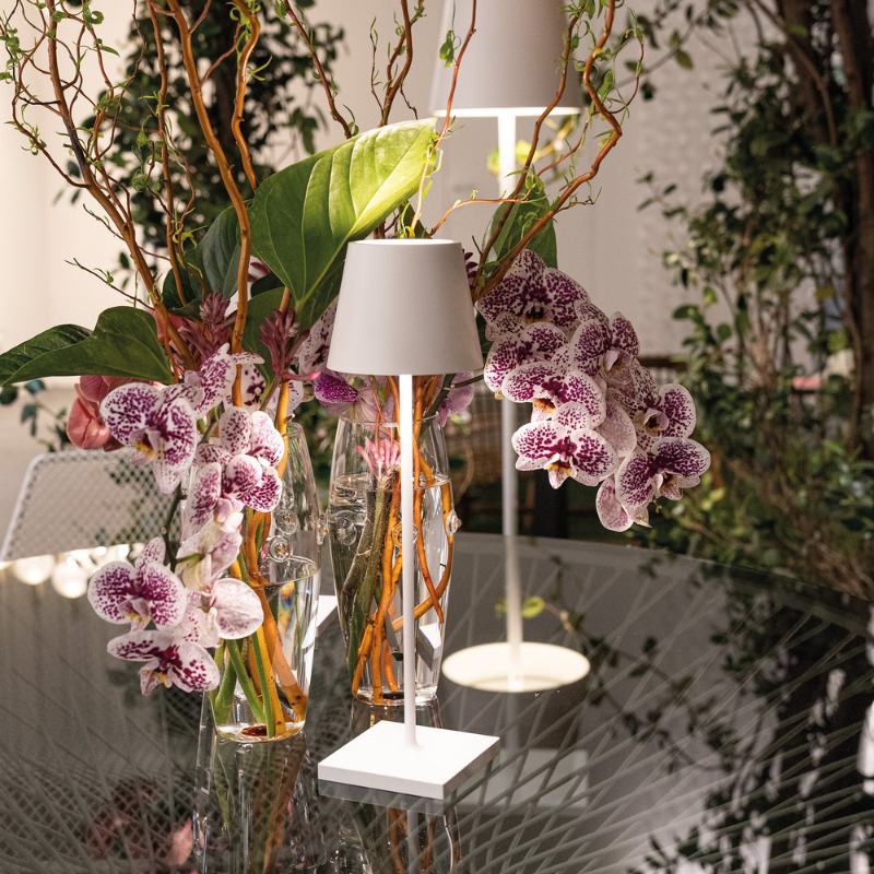 The white Poldina Pro Micro from Zafferano in a dining room.