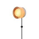 The Ripple Corded Sconce with plug-in bottom in copper exterior shade with natural anodized.