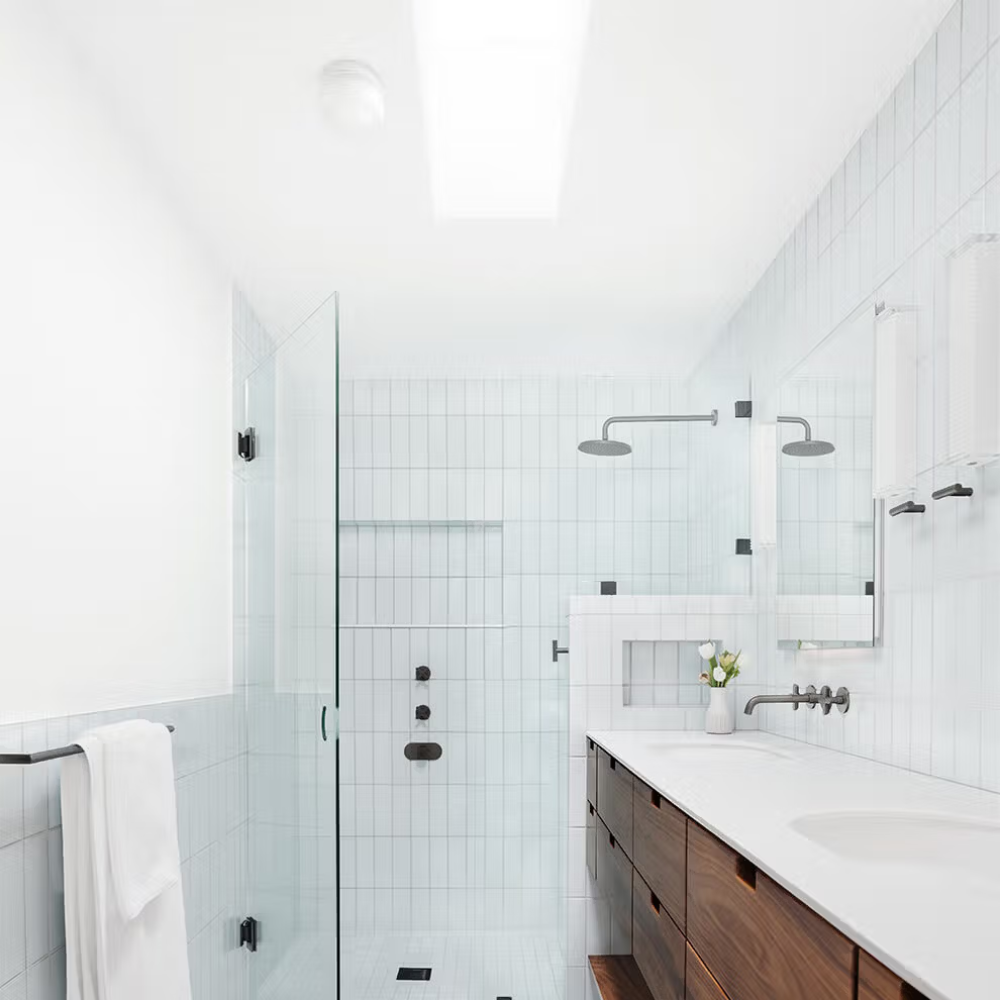 The Dimple Sconce by RBW with White Interior and Natural Anodized installed on a ceiling in a bedroom.