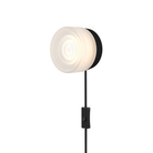 The Ripple Corded Sconce with plug-in bottom with toggle switch in frosted shade with black anodized.
