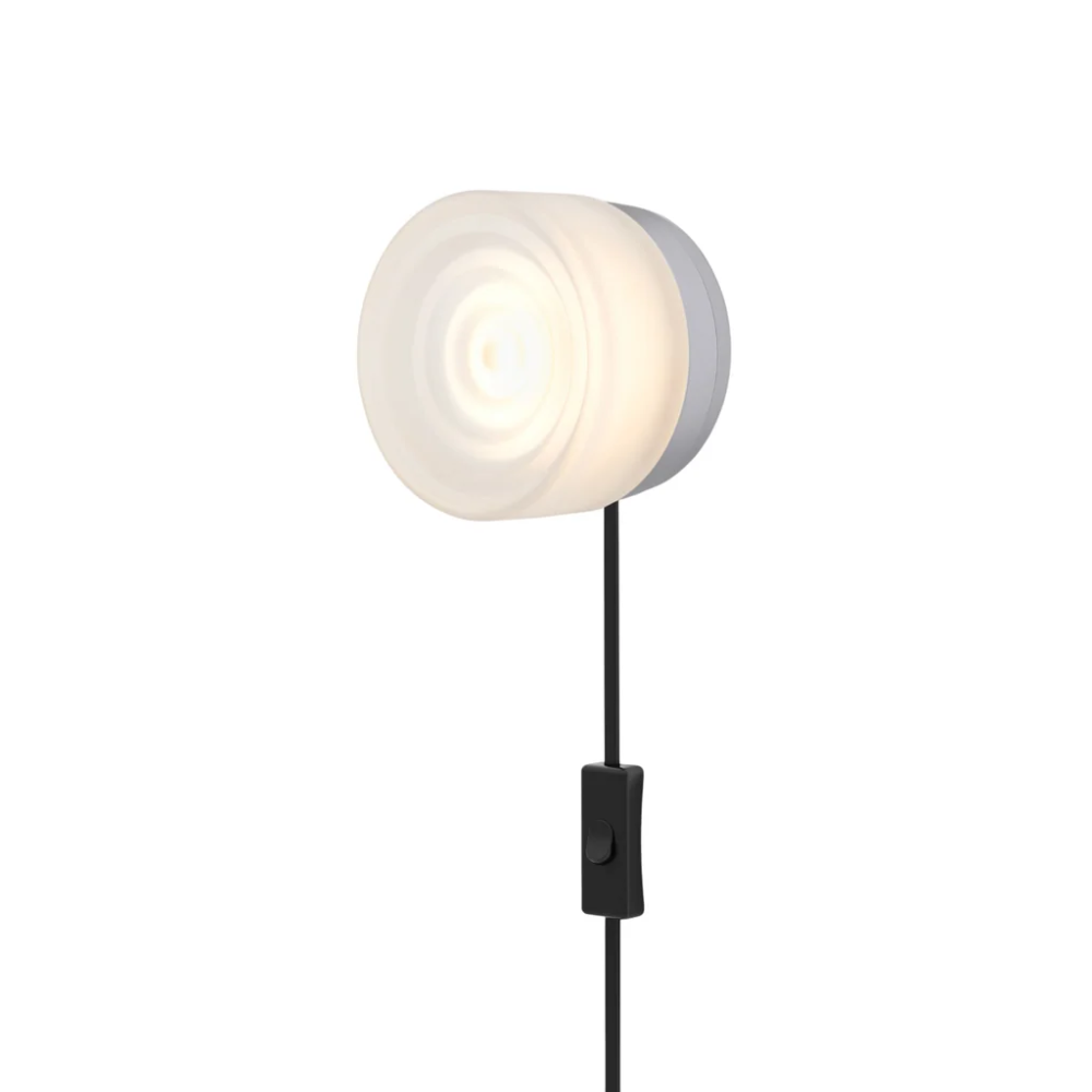 The Ripple Corded Sconce with plug-in bottom with toggle switch in frosted shade with natural anodized.