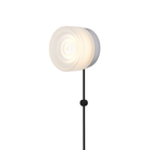 The Ripple Corded Sconce with plug-in bottom in frosted shade with natural anodized.