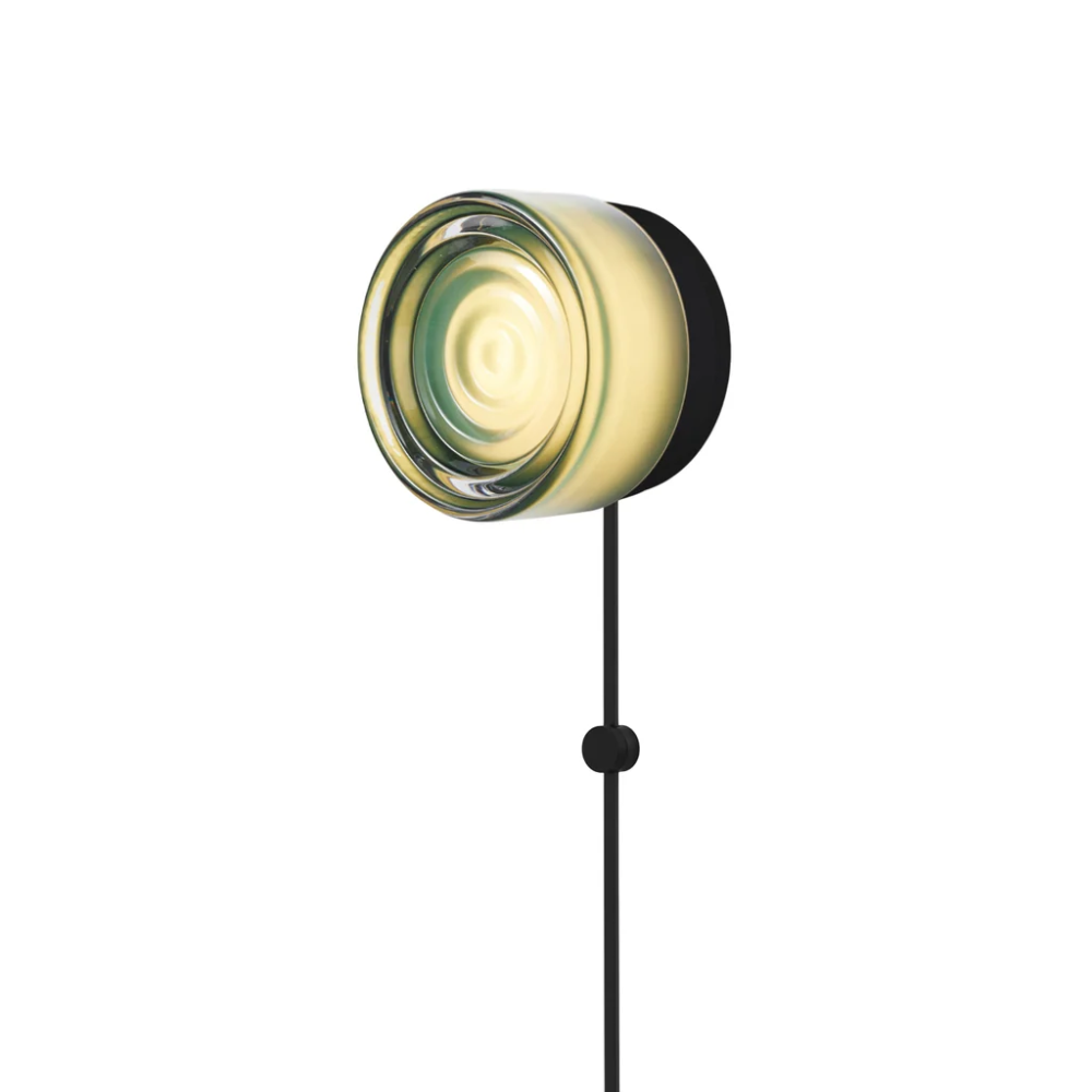The Ripple Corded Sconce with plug-in bottom in jade shade with black anodized.