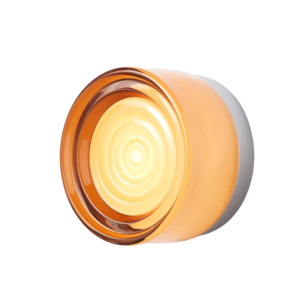 The Ripple Sconce by RBW in Copper Exterior with natural anodized.