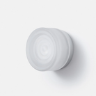 The Ripple Sconce by RBW in frosted with natural anodized turned off.
