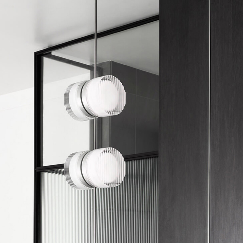 A pair of Crisp Sconces by RBW installed on a mirror. all-groups
