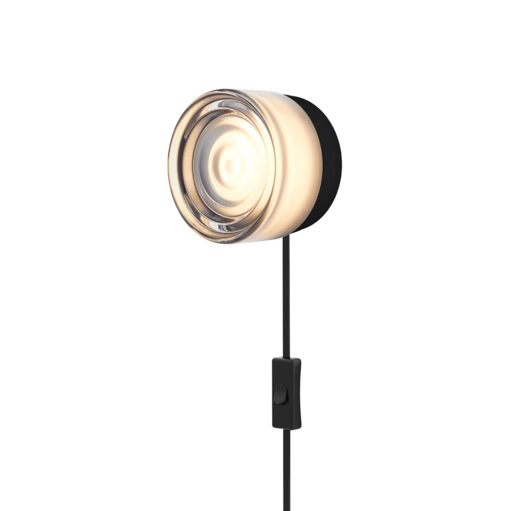 The Ripple Corded Sconce with plug-in bottom with toggle switch in smoke shade with black anodized.