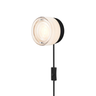 The Ripple Corded Sconce with plug-in bottom with toggle switch in white interior shade with black anodized.