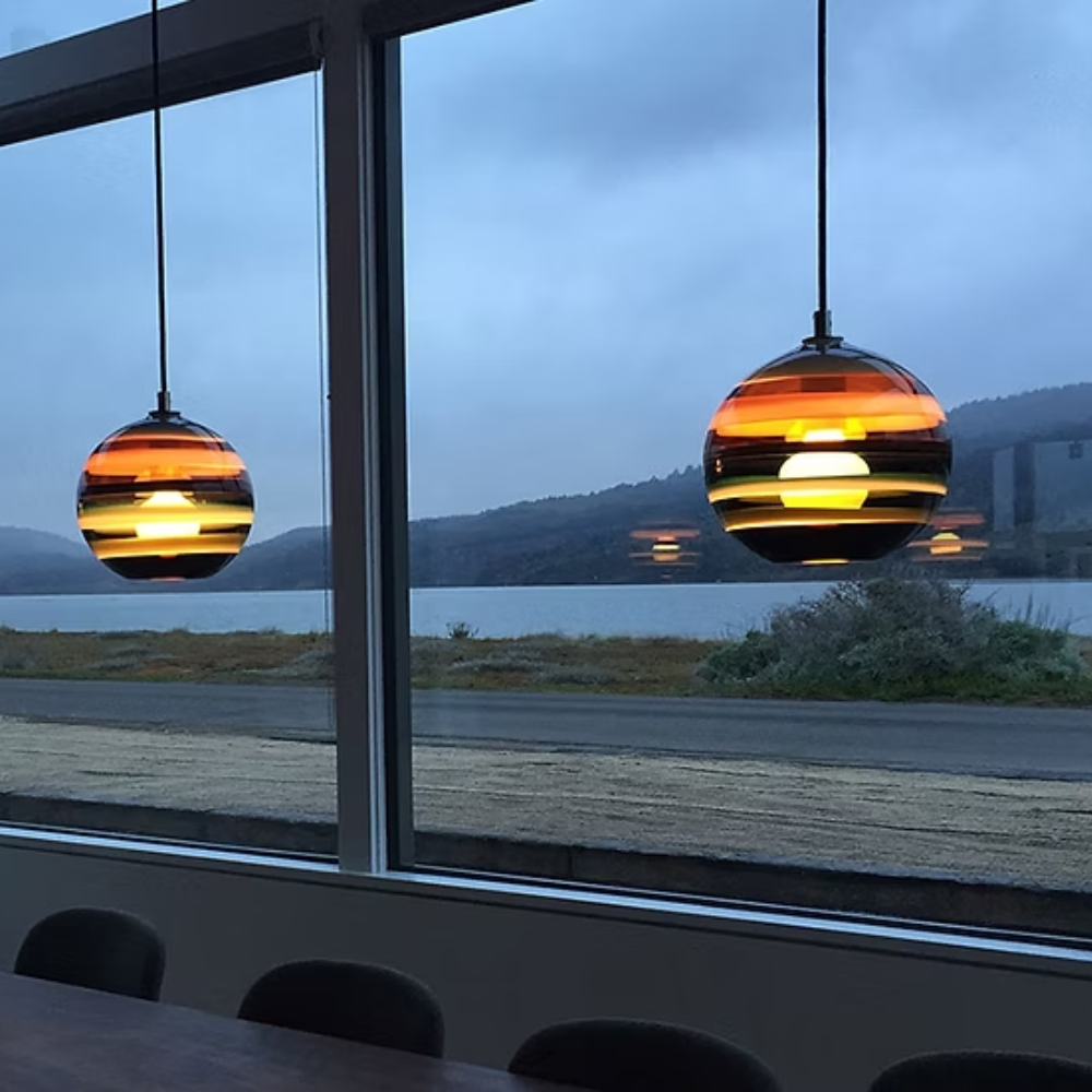 The Banded Amber Mini Pendant from Siemon and Salazar in a meeting room.