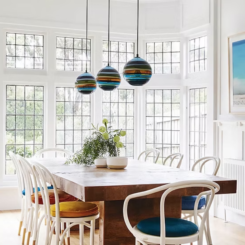 The Banded Aqua Mini Pendant from Siemon and Salazar in a family room.