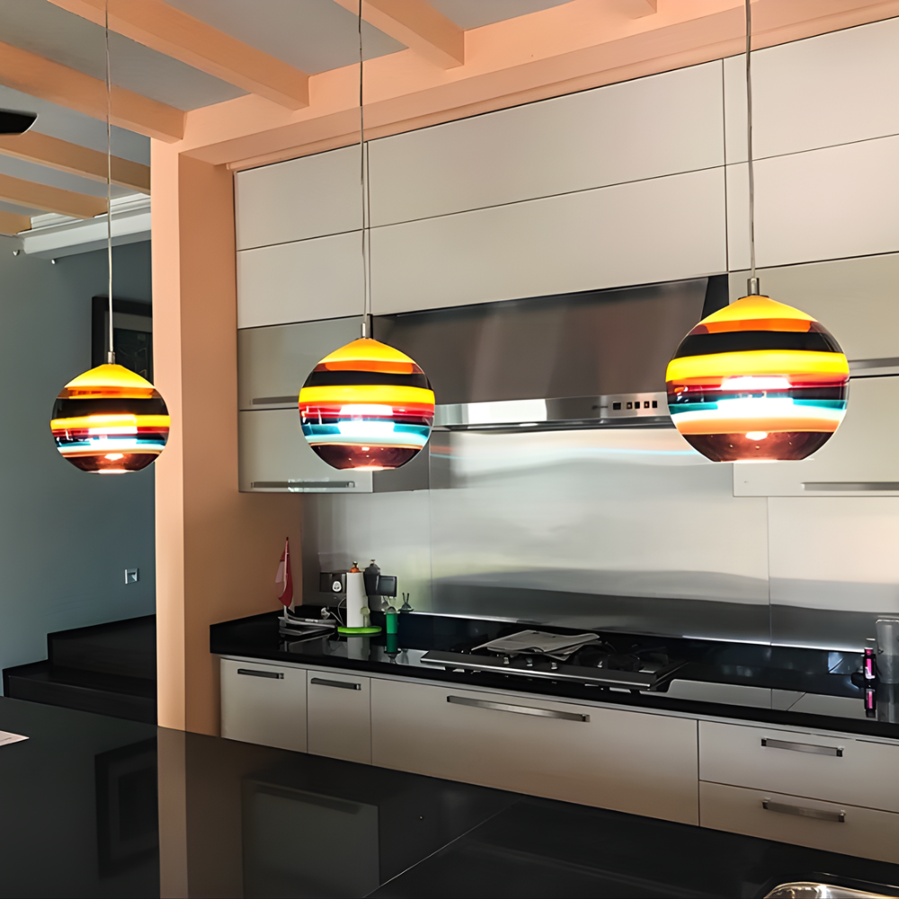 The Banded Cranberry Mini Pendant from Siemon and Salazar in a kitchen.