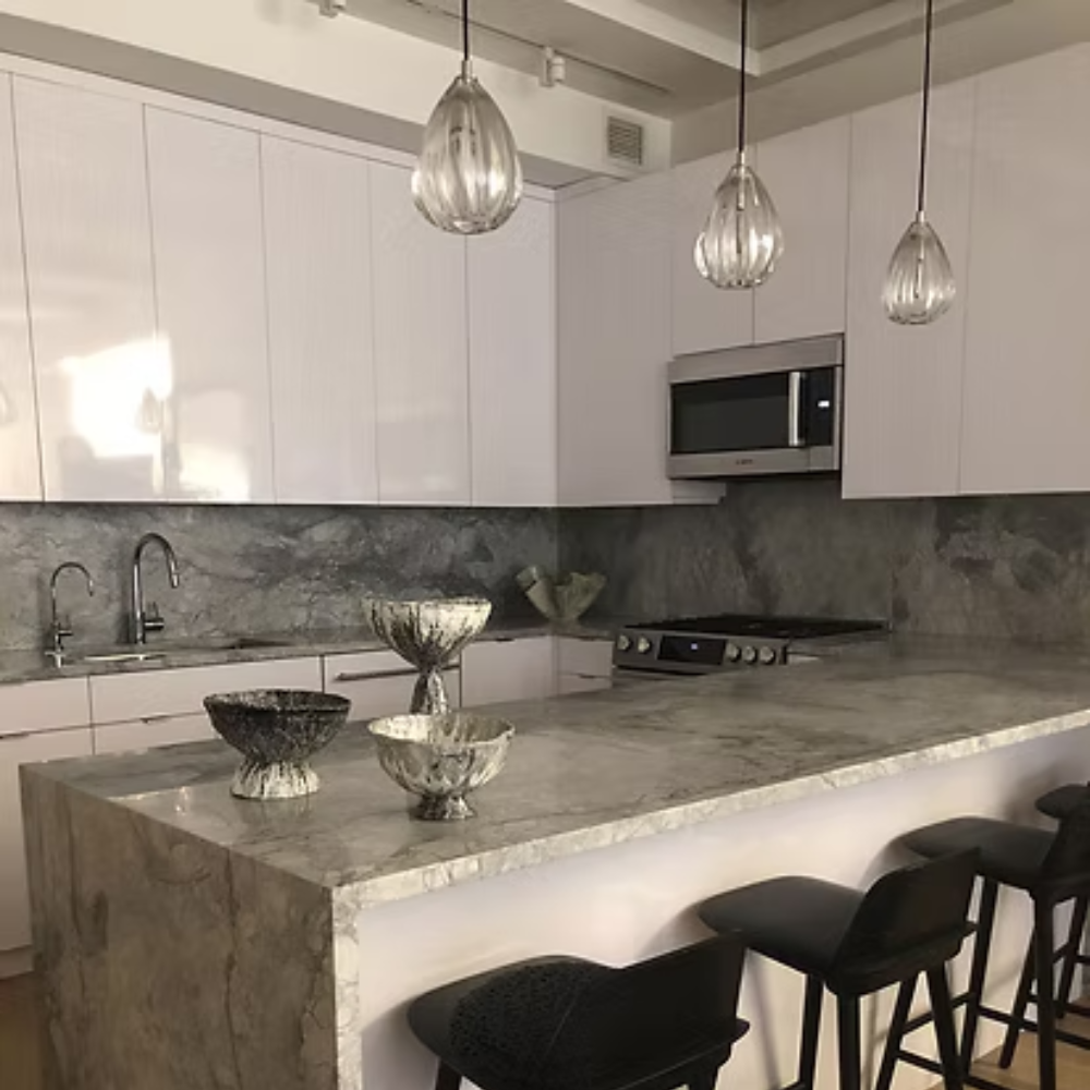 The Barnacle Large Cone Pendant from Siemon and Salazar in a kitchen and dining space.