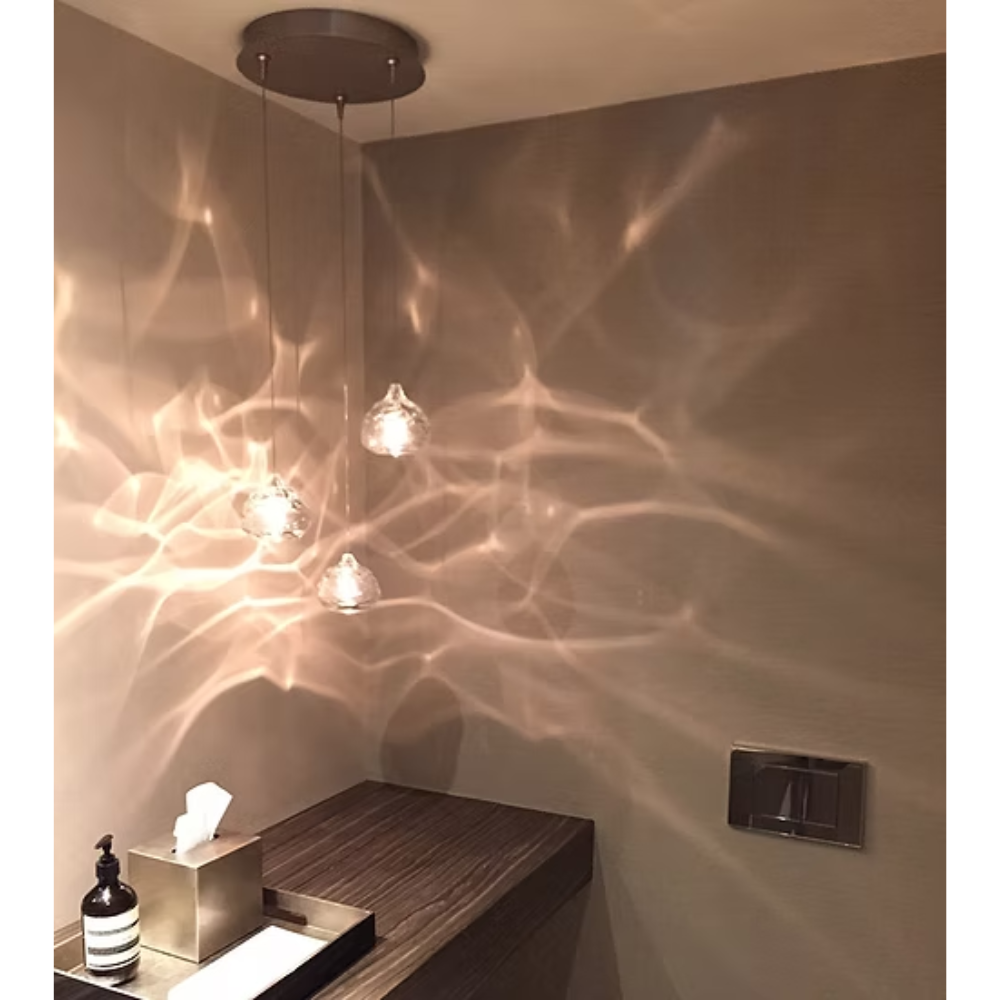 The clear Happy Small Pendant from Siemon and Salazar in a home office.