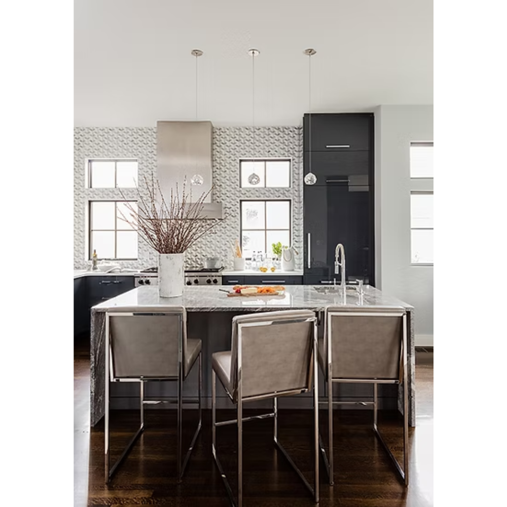 The clear Happy Small Pendant from Siemon and Salazar in a kitchen.