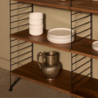 The Floor Shelving Two Bay (Living Room Bundle A) from String Furniture in black and walnut in a living room. all-groups