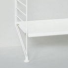 The String Furniture floor shelving unit details.