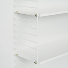 The String Furniture floor shelving unit details.