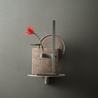 The Museum NM&.045 Console Shelf from String Furniture in beige on a wall.