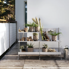 The String Outdoor Bundle from String Furniture on a patio.