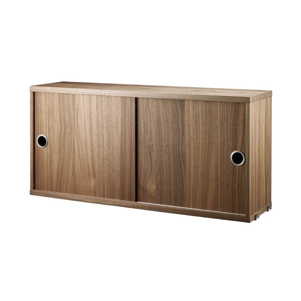 The Cabinet with Sliding Doors from String Furniture in the 7.8 inch depth size and walnut color.