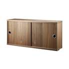 The Cabinet with Sliding Doors from String Furniture in the 7.8 inch depth size and walnut color.