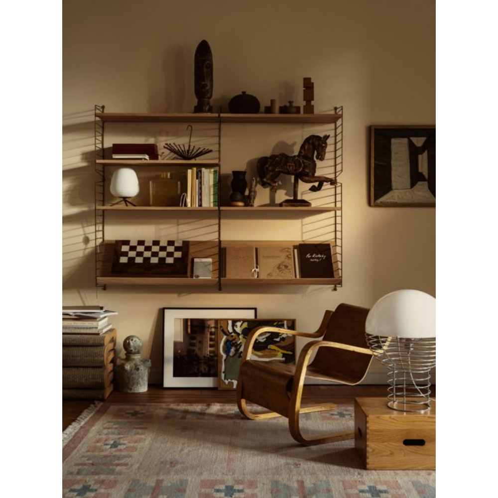 The String System by String Furniture dark red wall panels 19.6 H x 7.8 D and 29.5 H x 7.8 D Inch with oak shelves.