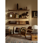 The String System by String Furniture dark red wall panels 19.6 H x 7.8 D and 29.5 H x 7.8 D Inch with oak shelves.