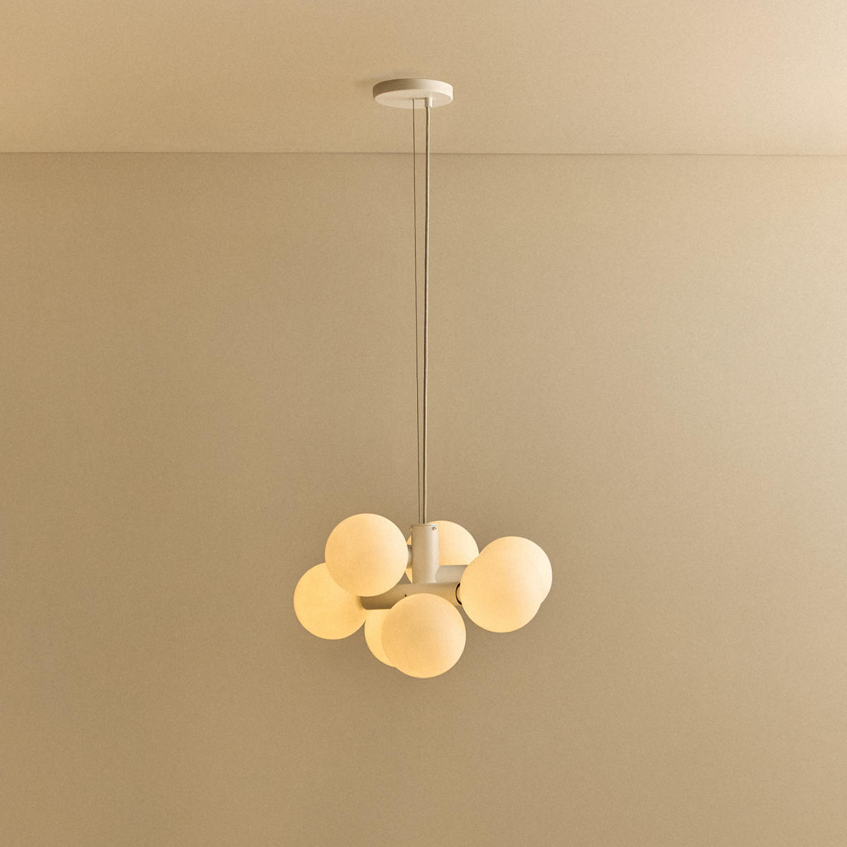 The Echo Chandelier by Tala Lighting, turned on.