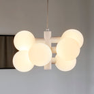 The Echo Chandelier by Tala Lighting in a living room.