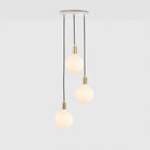 The Triple Pendant in Brass + Sphere IV with White canopy by Tala US.