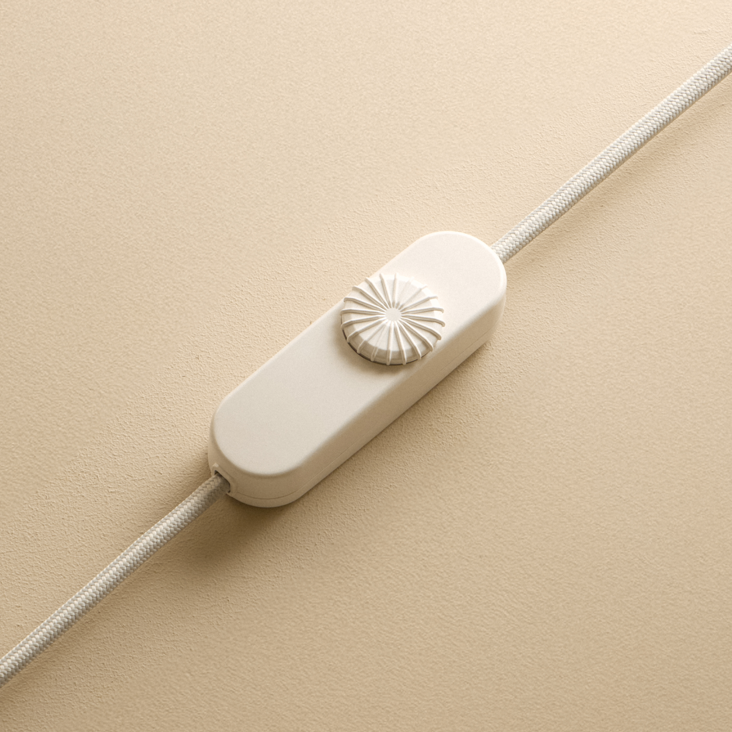 The switch of the Shore Table Lamp from Tala Lighting in Sea Green.