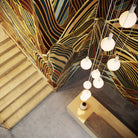 The Alumina Nine Pendant with Sphere V bulbs by Tala Lighting from above.