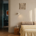 The Core Recessed Spotlight + T50 Light Engine by Tala Lighting in white in a bedroom being used as bedside reading lights. all-groups