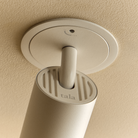 Detailed image of the trim of the Core Recessed Spotlight + T50 Light Engine by Tala Lighting in white.