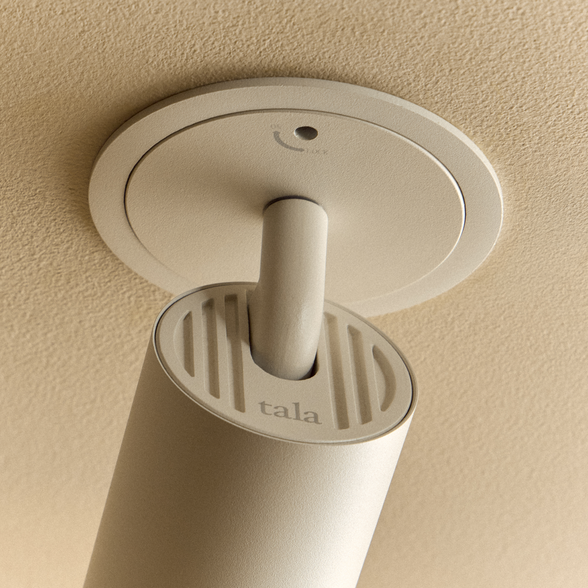 Detailed image of the trim of the Core Recessed Spotlight + T50 Light Engine by Tala Lighting in white.