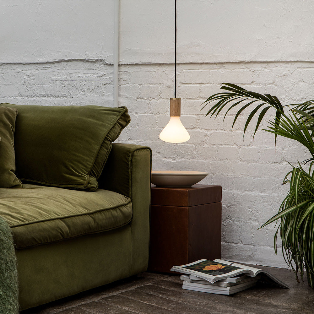 The Noma E26 LED Bulb by Tala Lighting in a living room.