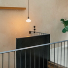 The Oval E26 Dim-to-Warm LED Bulb by Tala Lighting in pendant.