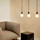 The Sphere III E26 Dim-to-Warm LED Bulb by Tala Lighting in a living room.