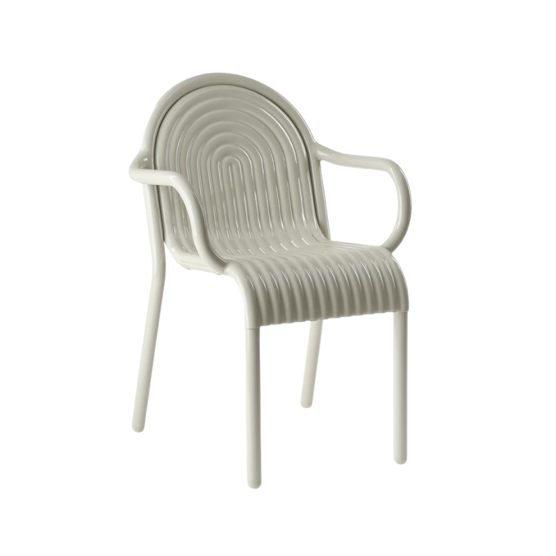 Side view of the Groove Arm Dining Chair in Putty by Tom Dixon.