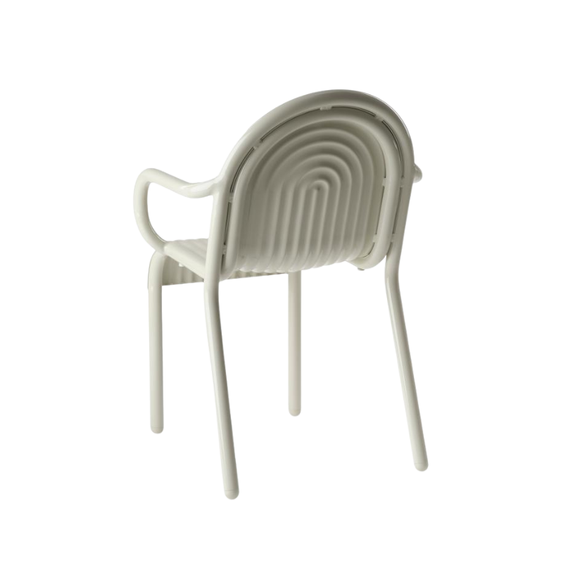 Rear angle view of the Groove Arm Dining Chair in Putty by Tom Dixon.