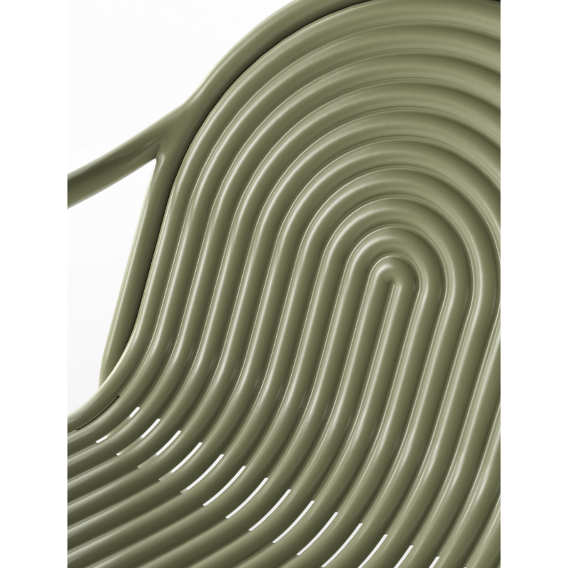 Detailed view of the Groove Outdoor Lounge Chair by Tom Dixon in Moss.