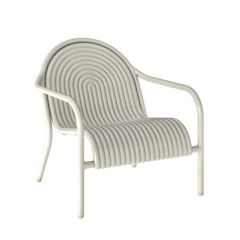 The Groove Outdoor Lounge Chair by Tom Dixon in Putty.