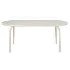 Groove Large Oval Outdoor Table in Putty by Tom Dixon from the side.