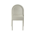 The Groove Arm Dining Chair in Putty by Tom Dixon.