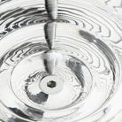 Tom Dixon Press Sphere Pendant up close.