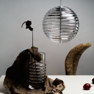 Tom Dixon Press Medium Sphere Pendant over dining table turned off.