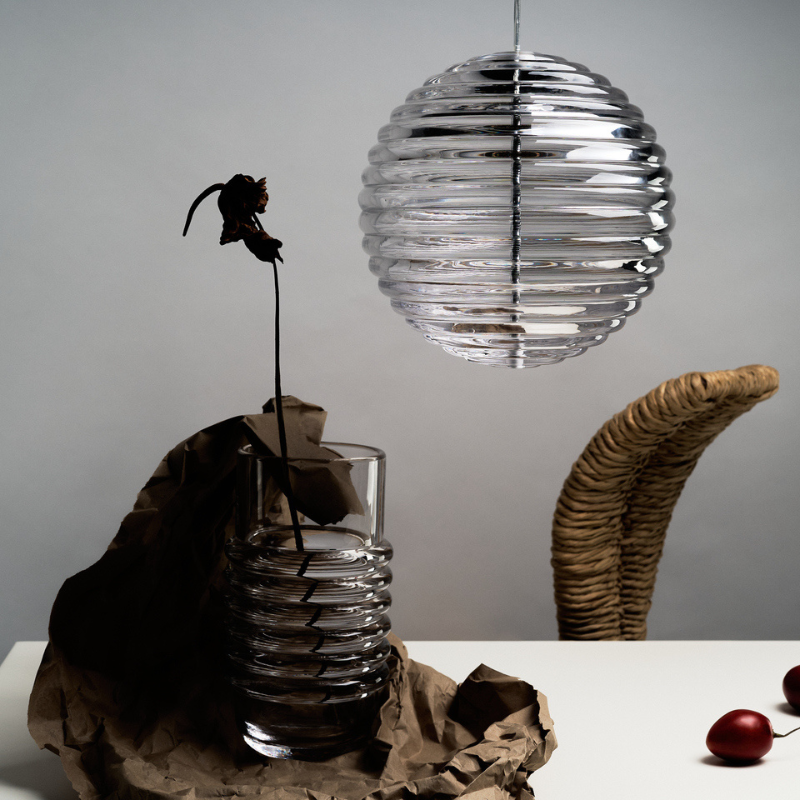 Tom Dixon Press Medium Sphere Pendant over dining table turned off.