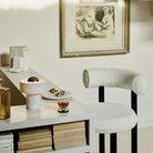 The Stone Portable Light by Tom Dixon in Silver on a bar.