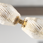 The Collier 108 Chandelier from Visual Comfort and Co in natural brass connector in detail