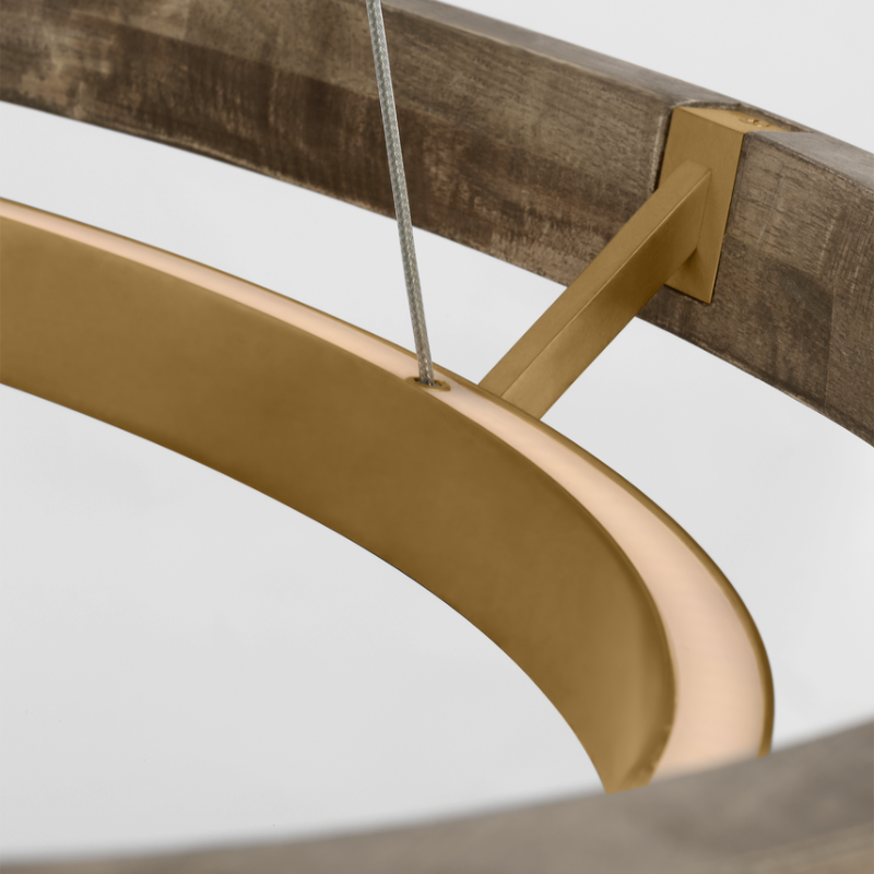 The Grace Chandelier by Sean Lavin is designed with two rings that illuminate this contemporary chandelier. A large outer ring provides organic texture while complemented by a decorative inner ring, housing gently diffused upward and downward LEDs.